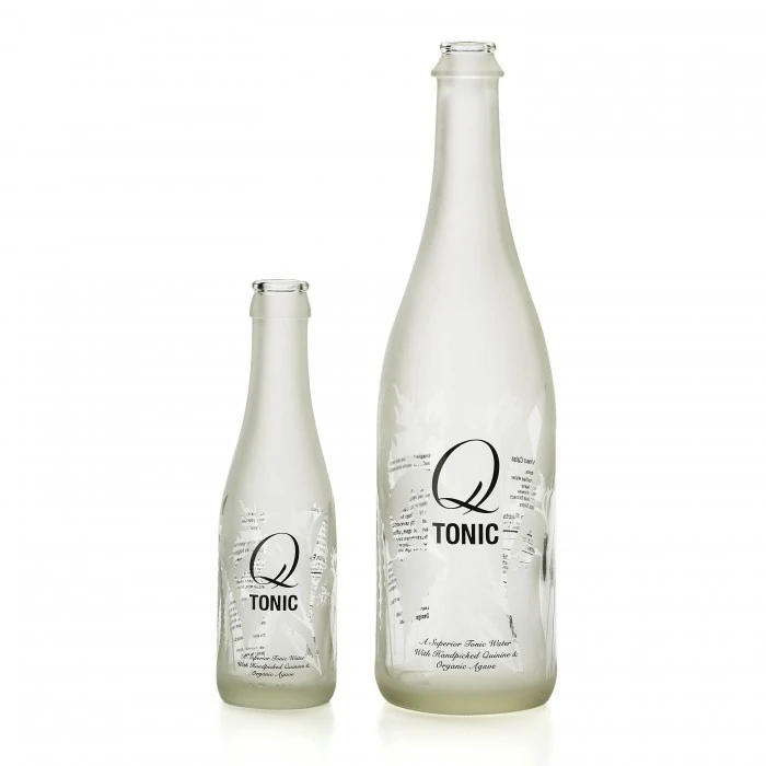 Masked clear and Frosted bottles with knocked out leaves pattern; 360 degree Silk Screened black deco