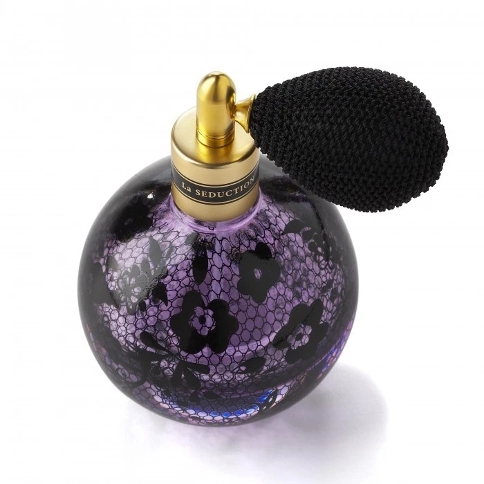 Organic translucent purple Spray Coating with seamless black lace pattern printed directly on the round bottle